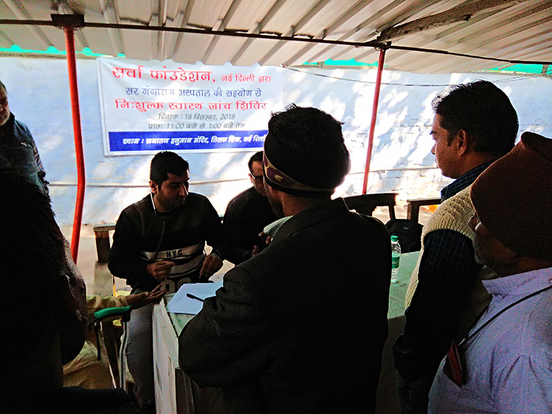 Health Check up and medicine distribution camp at Tilak Bridge, New Delhi